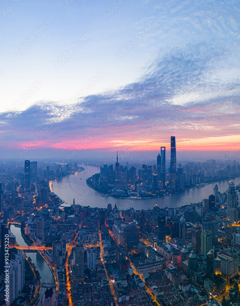 Obraz premium Aerial view of modern city skyline and buildings at sunrise in Shanghai