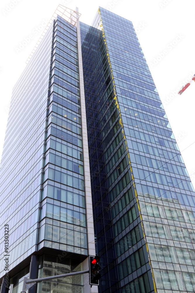 Obraz premium Architectural details of tall buildings and structures close-up.
