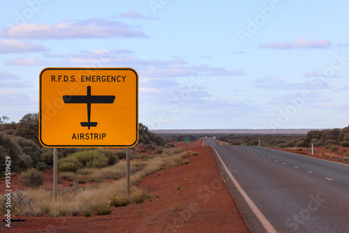 Sign of Royal Flying Doctor Service (RFDS) emergency airstrip, next to road, Western Australia Outback photo