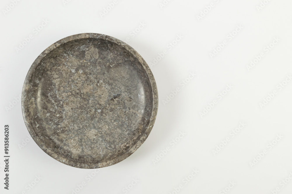 Top view of brown marble plate on white background. Food presentation, stone tray. Copy space, flat lay. Top view of brown marble plate on white background. Food presentation, stone tray. Copy space, flat lay.