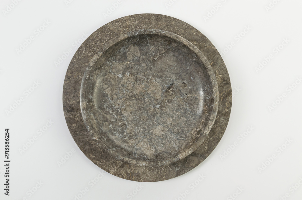Top view of brown marble tray and plate on white background. Food presentation, stone tray. Copy space, flat lay. Top view of brown marble tray and plate on white background. Food presentation, stone tray. Copy space, flat lay.