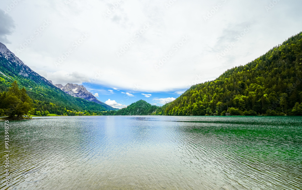 Landscape at Hintersteiner See near Scheffau in Tyrol. Idyllic nature at the mountain lake in the Wilder Kaiser nature reserve in Austria.
Landscape at Hintersteiner See near Scheffau in Tyrol. Idyllic nature at the mountain lake in the Wilder Kaiser nature reserve in Austria.