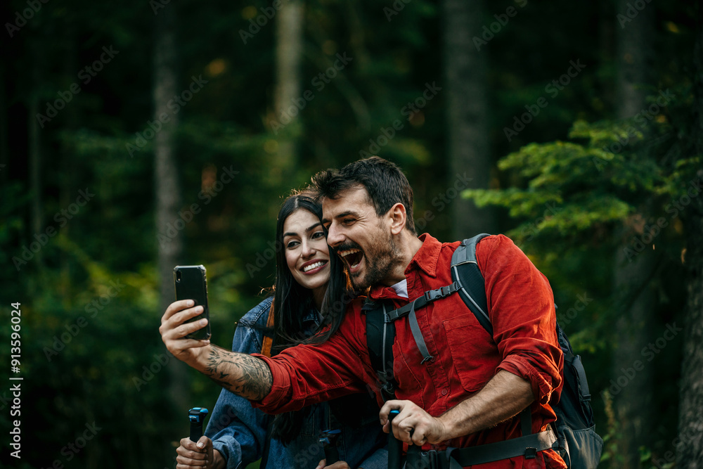 A couple walking through nature. Trekking, camping and wild life concept. Family getaway A couple walking through nature. Trekking, camping and wild life concept. Family getaway