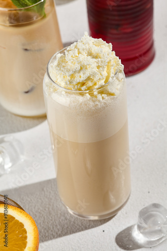 Refreshing Coffee-Based Frapuccino with Whipped Cream Topping photo