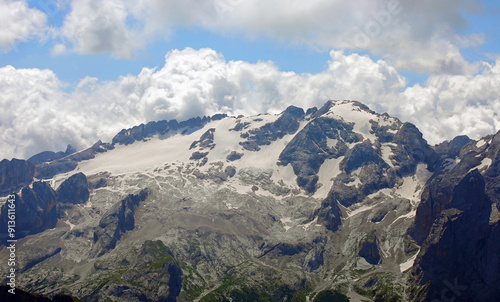 MARMOLADA mountain glacier in the Dolomites which is unfortunately melting due to climate change seen from the Alps photo