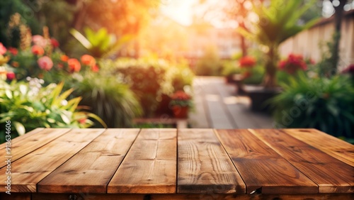 Wooden table on blurred green nature bench background. Empty wooden table and blurred green nature background