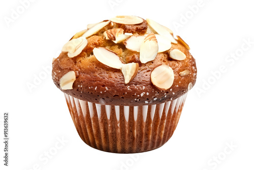 Almond muffin or apple cinnamon cupcake topped with crunchy nuts pieces isolated on white transparent background