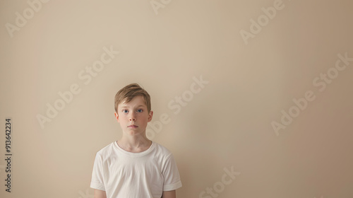 Tween Boy’s Boredom Captured in Wide Shot photo