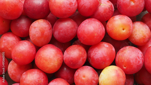 red prune fruit background