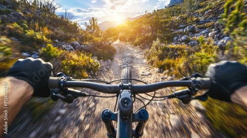 View shot of mountain biking on a rocky trail durin