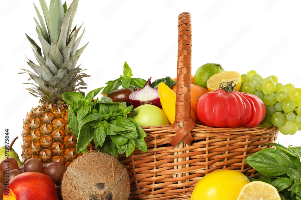 Different fresh fruits and vegetables in wicker basket isolated on white Different fresh fruits and vegetables in wicker basket isolated on white