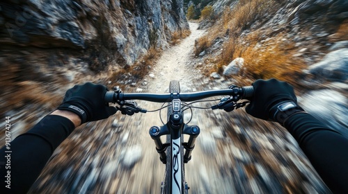 View shot of mountain biking on a rocky trail durin