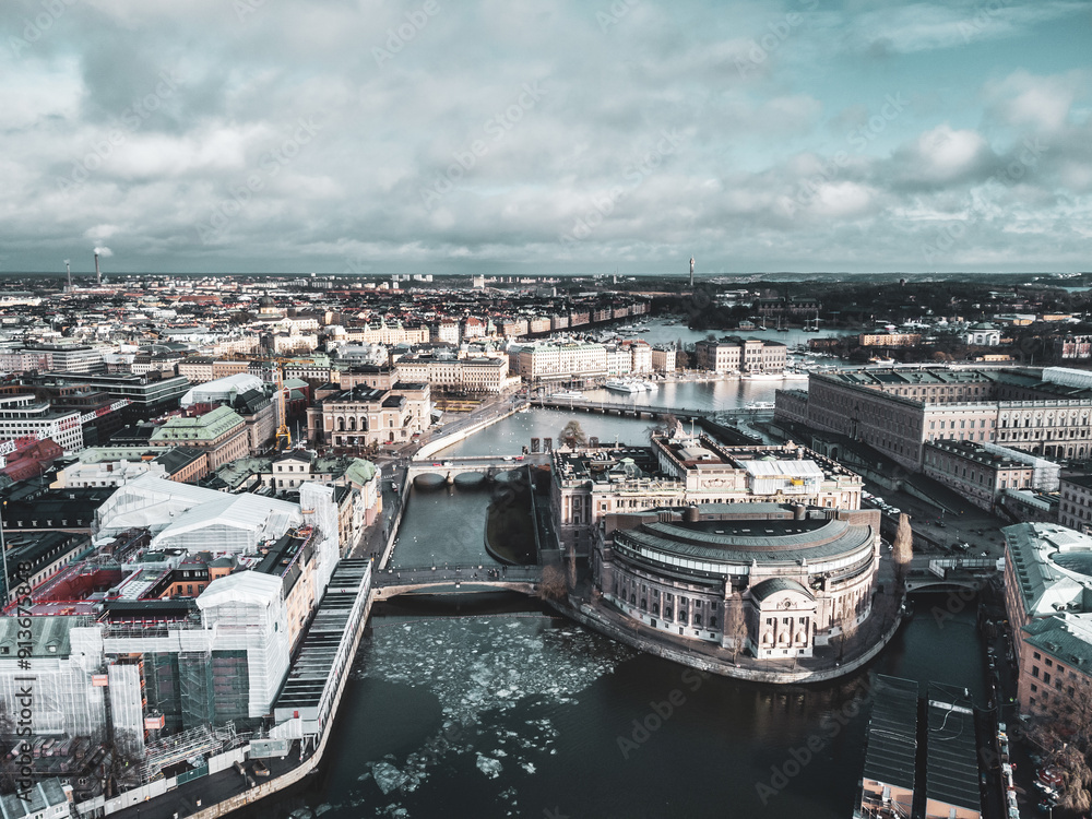 Stockholm, Sweden: Aerial view of the Stockholm Gamla Stan historic district with various landmarks such as the Royal palace and the governement house in, Sweden capital city in winter.