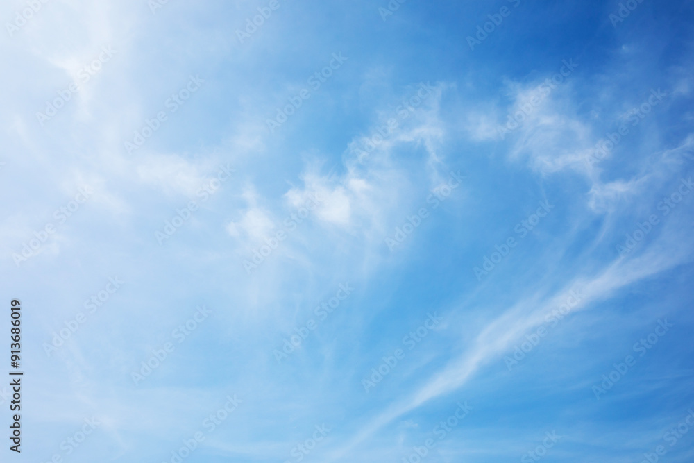 Fantastic soft white clouds against blue sky and copy space horizontal shape Fantastic soft white clouds against blue sky and copy space horizontal shape