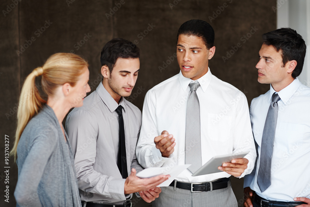 Fototapeta premium Group, business people and paperwork in office with tablet, discussion and review with information for justice. Law firm, men or lawyers with female client for immigration case, document and teamwork