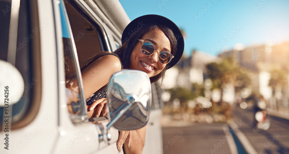 Naklejka premium Woman, travel and road trip in minivan as tourist on adventure, journey and vacation in Greece. Female person, happiness and excited for sightseeing, outdoor and fun for holiday, destination or drive