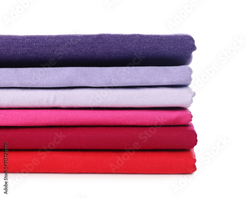 Stack of clean colorful t-shirts isolated on white