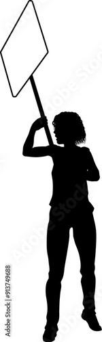 Protestor or demonstrator at a demonstration march, picket line or strike protest rally in silhouette. Holding up a banner or picket sign board placard.