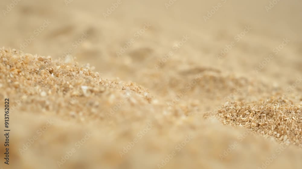 Close-Up of Golden Sand with Detailed Texture in a Warm, Soft Light 4k video Close-Up of Golden Sand with Detailed Texture in a Warm, Soft Light 4k video
