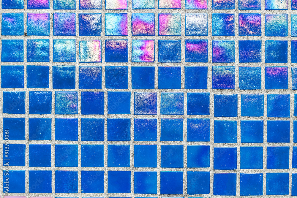 Texture of blue mother-of-pearl mosaic tiles, close-up