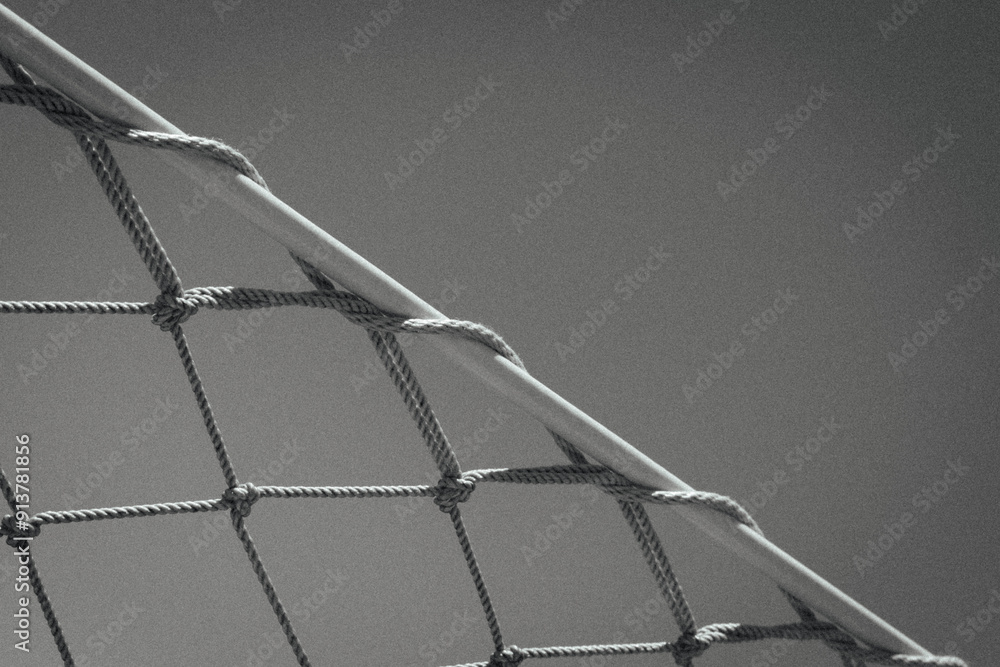 Net Rope Alpha black and white image shows a close-up of a rope net, possibly part of ...