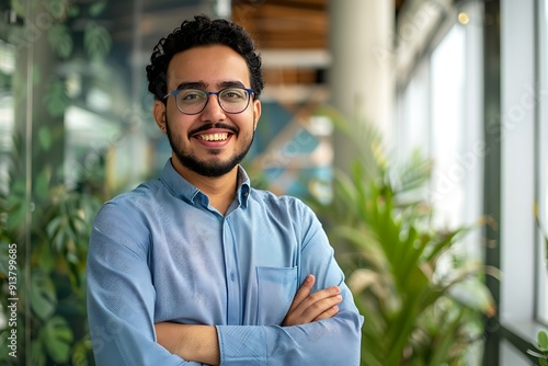 Smiling Man with Glasses in Office