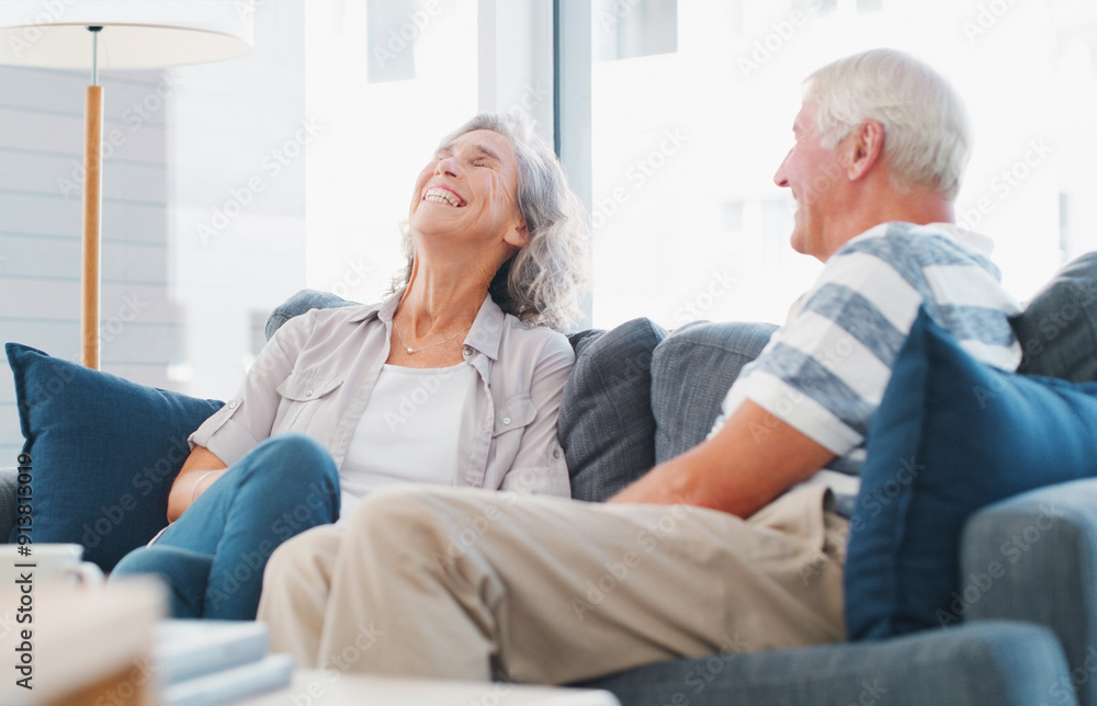 Senior couple, home and laugh on couch in living room on break, bonding and relax. People, relationship and smile or happy on retirement for conversation, chat and funny memories on sofa for care Senior couple, home and laugh on couch in living room on break, bonding and relax. People, relationship and smile or happy on retirement for conversation, chat and funny memories on sofa for care
