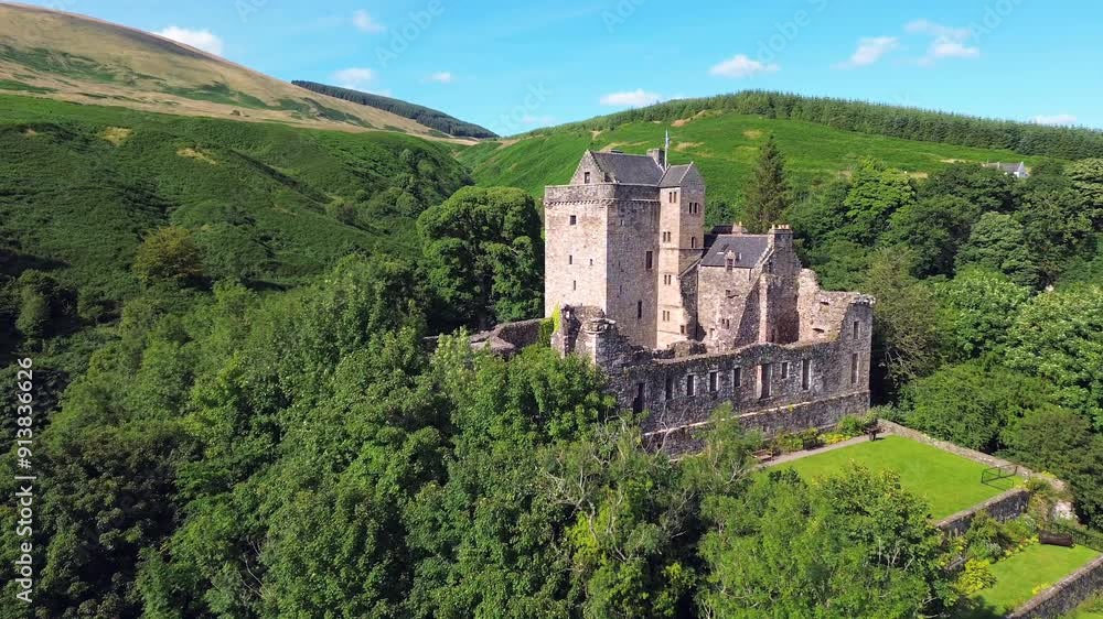 Aerial drone 4K film of Castle Campbell in Dollar in the Scottish highlands, medieval fort with fortification and ruin in high mountains and forest in Scotland near Edinburgh with flag blowing in wind Aerial drone 4K film of Castle Campbell in Dollar in the Scottish highlands, medieval fort with fortification and ruin in high mountains and forest in Scotland near Edinburgh with flag blowing in wind