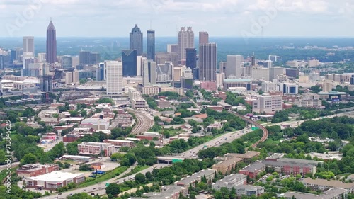 Establishing drone shot of Downtown Atlanta skyline and skyscrapers, street view, neighbourhood with urban parks and trees photo