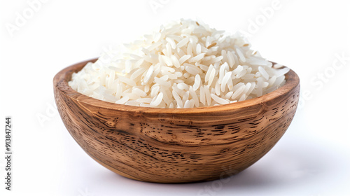 Rice in wooden dish on White background.  photo