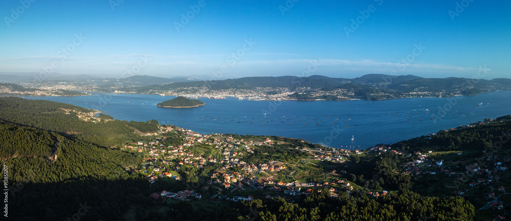 Aerial view of beaches and charming small villages along the Ría de Pontevedra in Galicia, Spain. Aerial view of beaches and charming small villages along the Ría de Pontevedra in Galicia, Spain.
