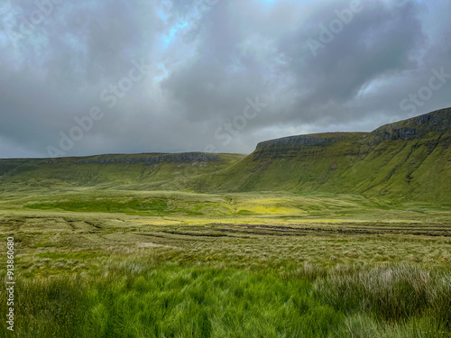 Dramatic Landscape of Benbulbin Under Stormy Skies photo