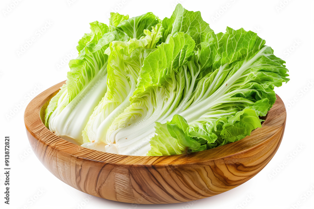 Beautiful Arrangement of Chinese Cabbage in wooden dish with Crisp, Green Leaves Against a White Background Ideal for Health and Nutrition Beautiful Arrangement of Chinese Cabbage in wooden dish with Crisp, Green Leaves Against a White Background Ideal for Health and Nutrition