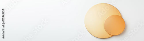 Empty golden product display podium setup with two gold circular podiums of different sizes , flat lay