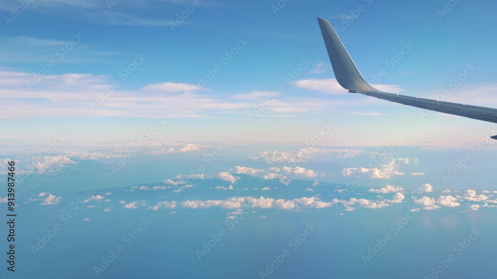 Scenic flight over clouds with ocean view in 4k Scenic flight over clouds with ocean view in 4k