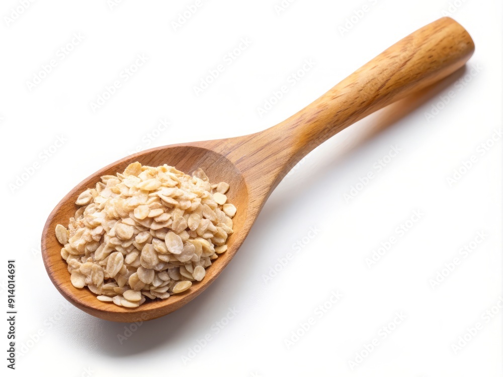 A single, rounded wooden spoon rests alone on a pristine white background, holding a small serving of creamy, beige-colored oatmeal, evoking warmth and simplicity. A single, rounded wooden spoon rests alone on a pristine white background, holding a small serving of creamy, beige-colored oatmeal, evoking warmth and simplicity.