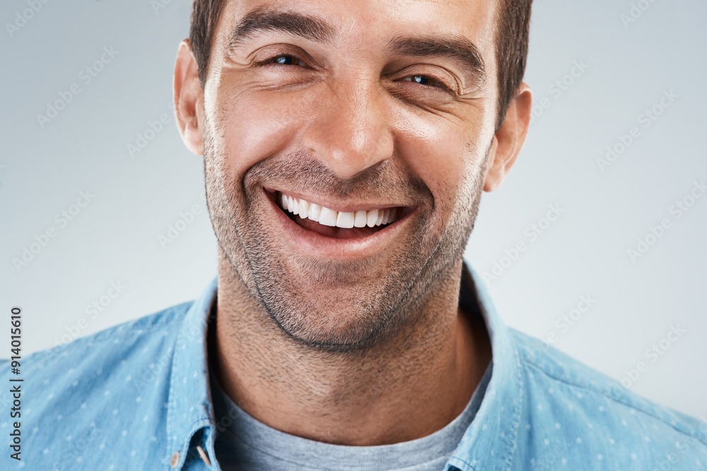 Fototapeta premium Smile, dentistry and portrait of man in studio with teeth cleaning for dental hygiene routine. Happy, oral care and face of person with mouth treatment for gum disease prevention by white background