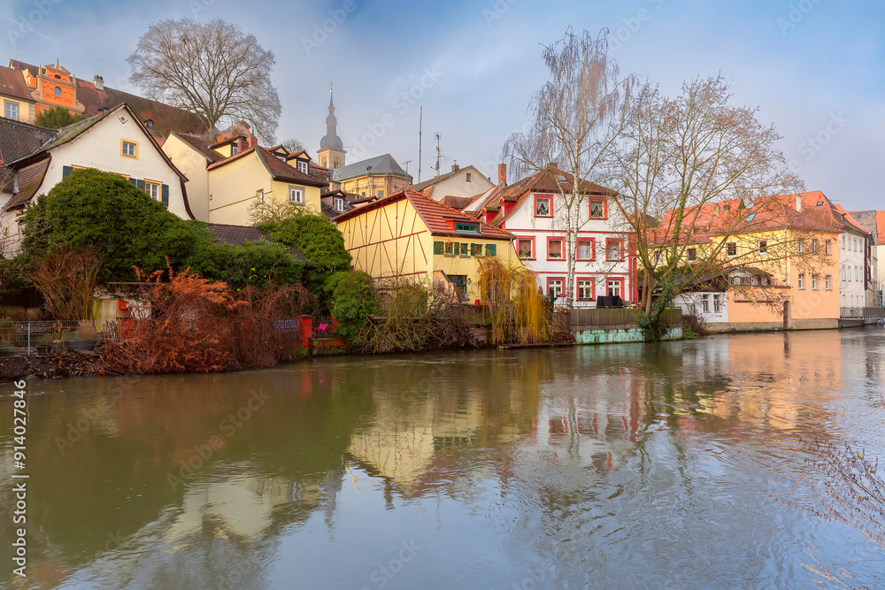 Daytime view of Bamberg Old Town with reflections on the Regnitz River in Bamberg, Germany Daytime view of Bamberg Old Town with reflections on the Regnitz River in Bamberg, Germany