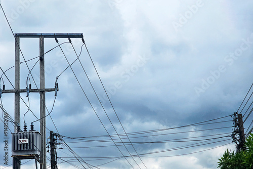 Wallpaper Mural Electric transformer and numerous wires stretched across an overcast sky Torontodigital.ca