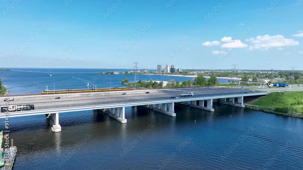 Aerial view of the Hollandse Brug A6 between Amsterdam and Almere with Almere Duin in the background Aerial view of the Hollandse Brug A6 between Amsterdam and Almere with Almere Duin in the background
