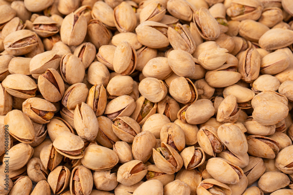 Tasty pistachios isolated on a white background. Tasty pistachios isolated on a white background.