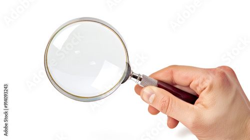 Hand holding magnifying glass on white background