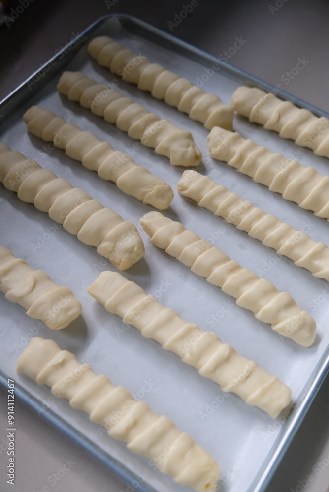 Making homemade cheese roll pastry.