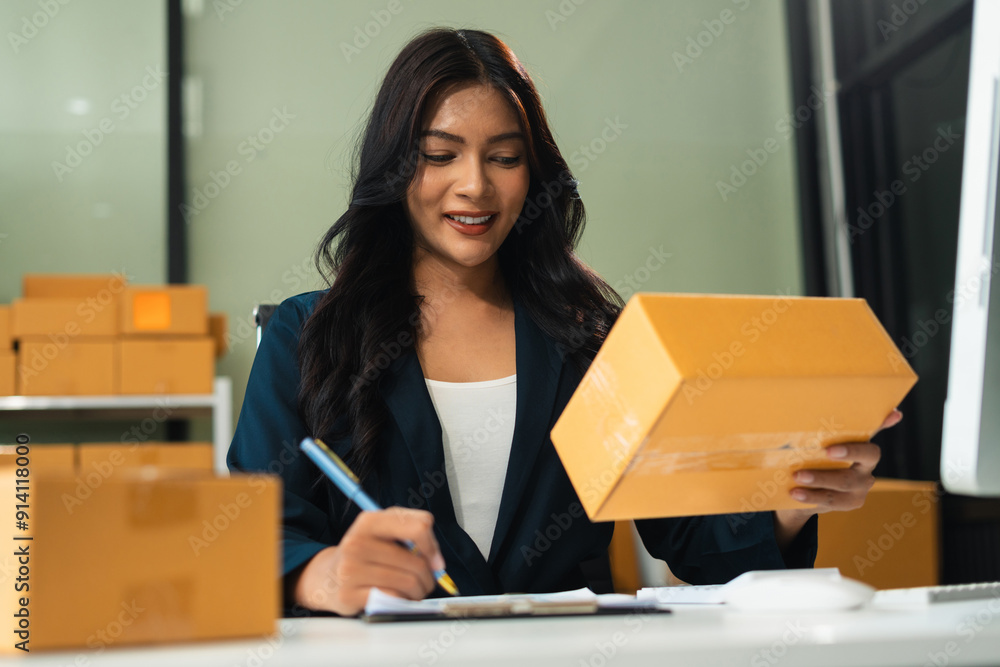 Successful Woman online seller. small business entrepreneur SME or Asian woman working freelance with online sell at home. Successful Woman online seller. small business entrepreneur SME or Asian woman working freelance with online sell at home.