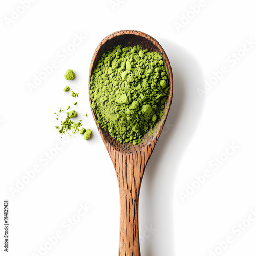 
matcha powder on a wooden spoon, on white background