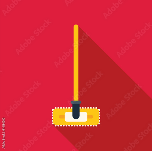 Yellow cleaning mop with long handle standing on red floor, top view