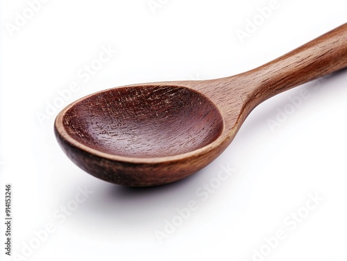 A brown wooden spoon on a white background photo