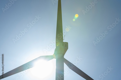 Renewable Energy Giant: Wind Turbine Against the Radiant Sun