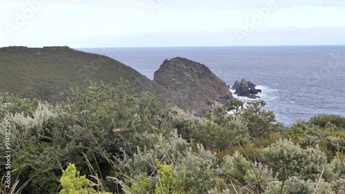  Wild Tasmanian Islands and coastal landscapes. Waves crashing against rocks on the wild coastline of Cape Bruny, Bruny Island, Tasmania, Australia. Lighthouse Bay on Bruny Island.