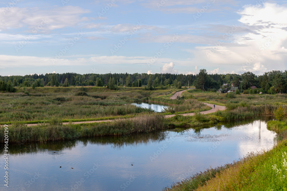 The river along which the village road runs. The river along which the village road runs.